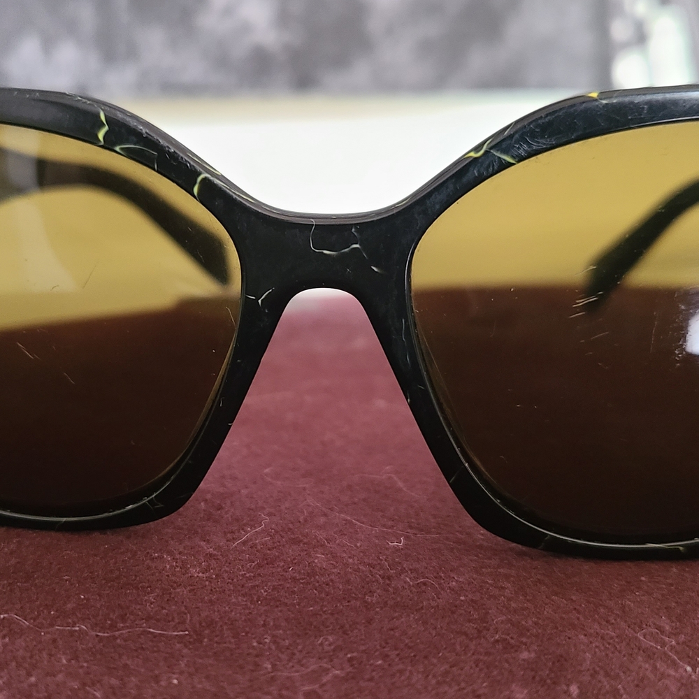 PRADA Black Marbled Women’s Sunglasses with Brown Lenses
